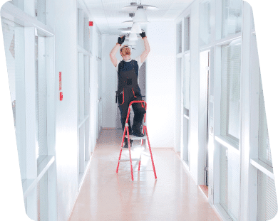 A man fixing lights.