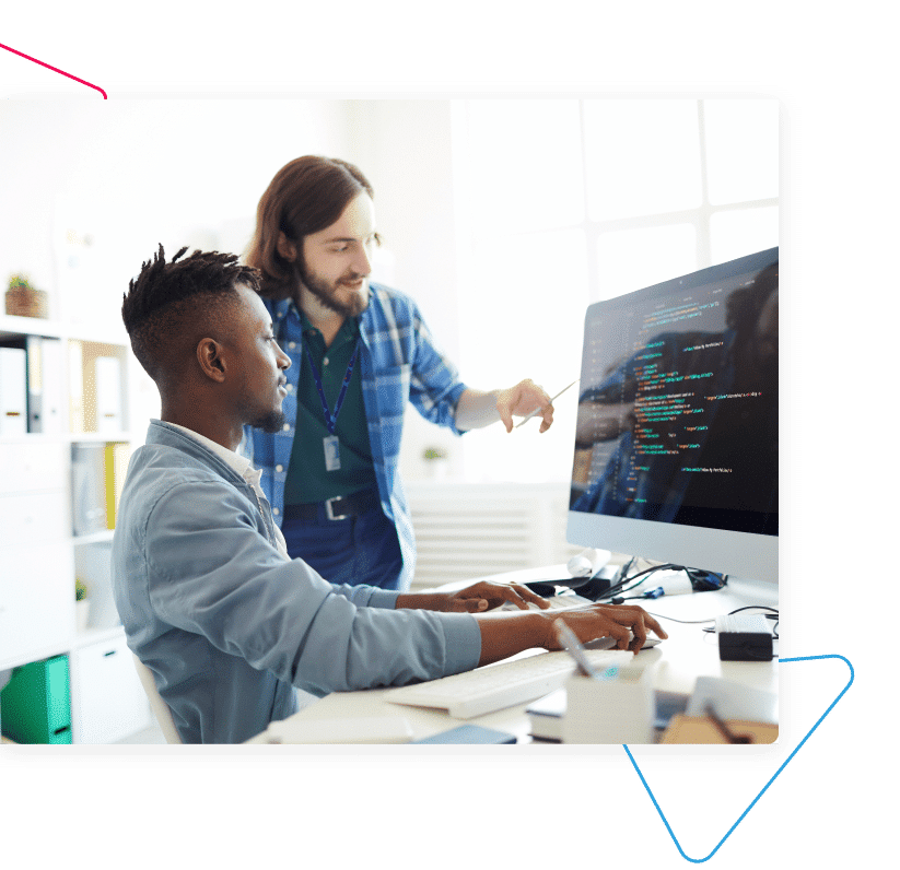 ITVET Engineer Helping Man In Suit With His Computer