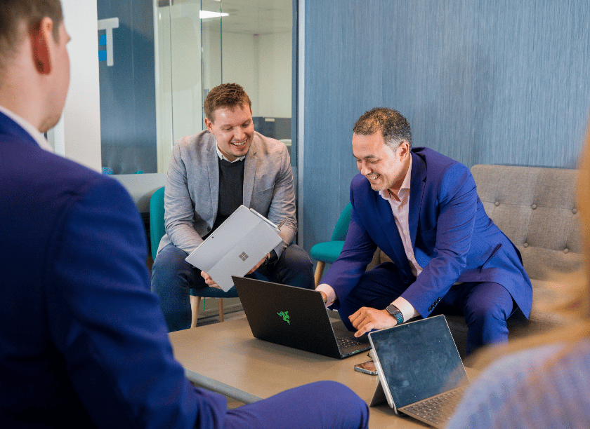 Three Members of ITVET Team Having A Meeting