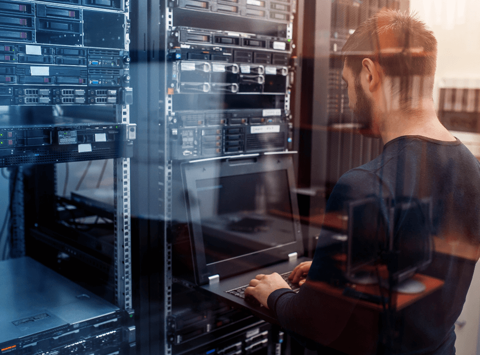 man working on a laptop to secure network