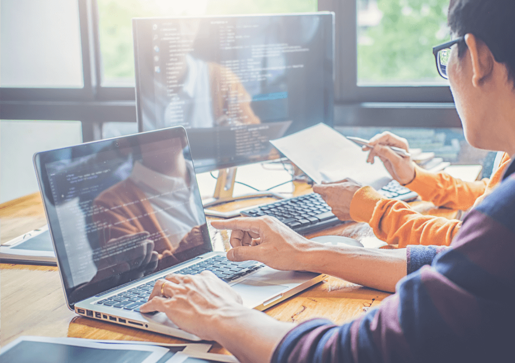 Man Using Network To Do Work On His Laptop