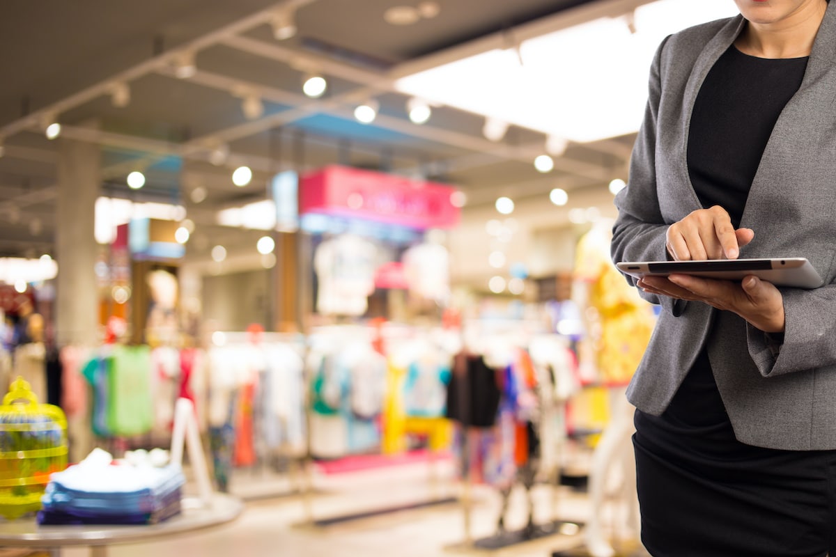 manager using tablet on shop floor