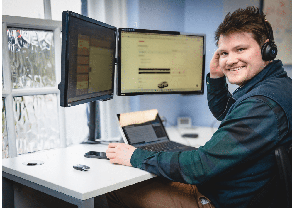 ITVET teammate working at his computer.